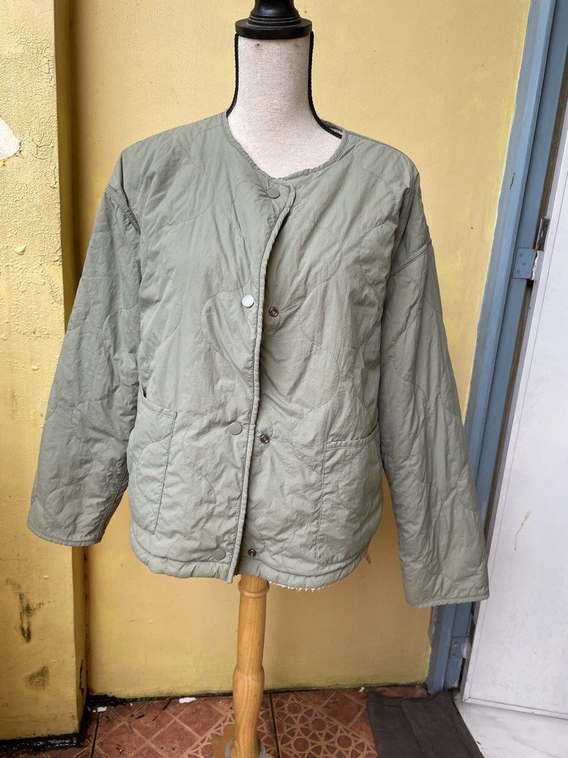 Reversible Quilted Fleece Jacket - Sage Green (Category: Coats, Jackets and Outerwear) located in Pasig City. Submitted by khaleisi (Listing ID 1455676386, Image 1). Description: - Super cozy reversible jacket - One side: Quilted sage green - Other side: Fluffy cream fleece - Snap button closure - Pockets on both sides - Ideal for layering and cooler weather - Bust 40-46” length 23”.