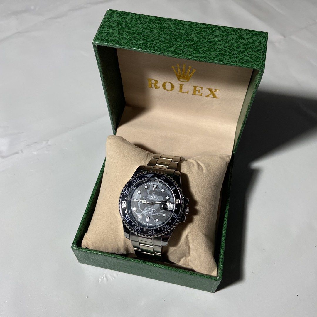 Rolex Submariner GMT-Master II Watch with Box (Category: Luxury Watches) located in Manila. Submitted by ashiee111 (Listing ID 1455836812, Image 1). Description: - Authentic Rolex Submariner GMT-Master II - Classic black dial - Durable silver metal bracelet - Secure fold-over clasp with safety clasp - Functional rotating bezel - Comes with original Rolex box - A superb timepiece for any collection.
