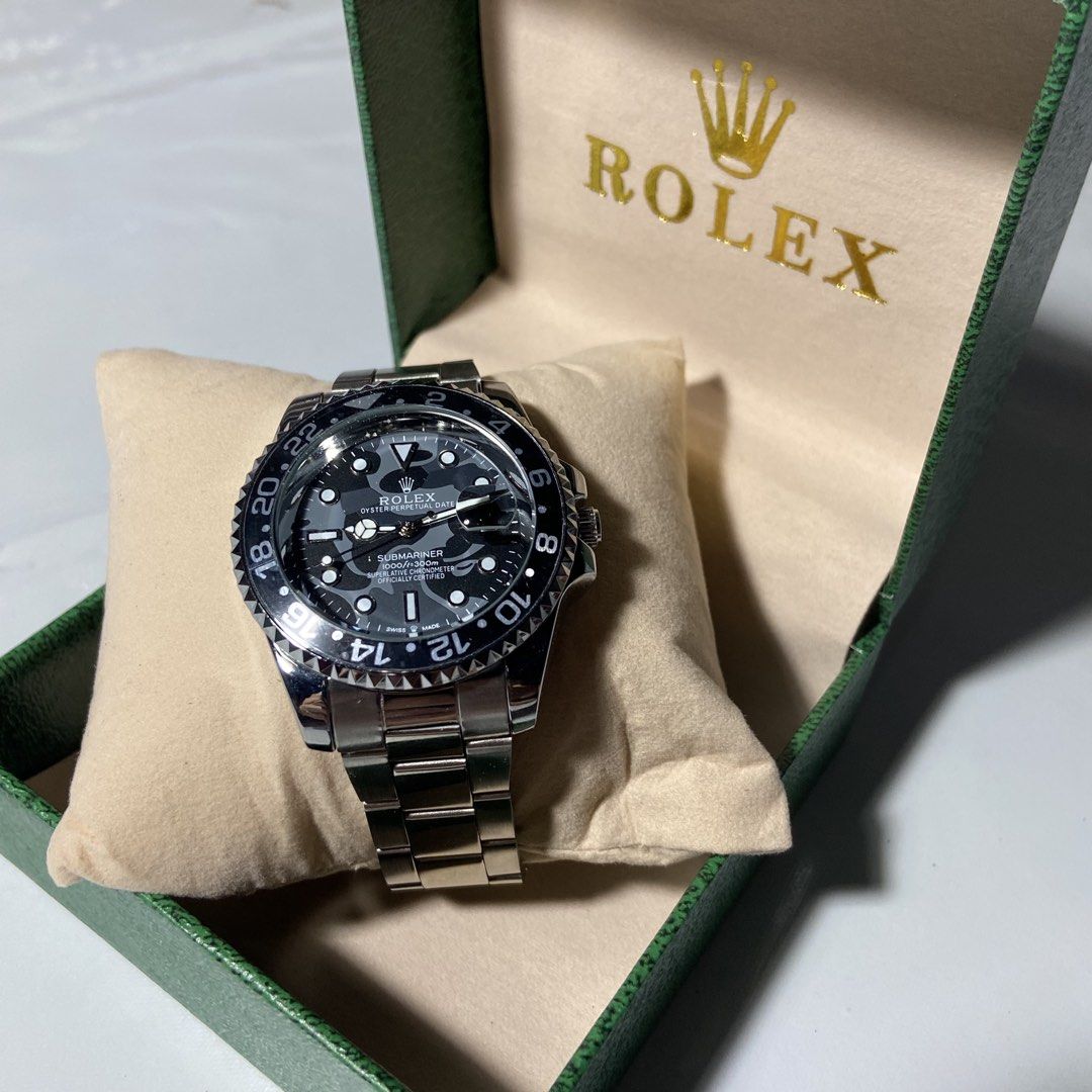 Rolex Submariner GMT-Master II Watch with Box (Category: Luxury Watches) located in Manila. Submitted by ashiee111 (Listing ID 1455836812, Image 2). Description: - Authentic Rolex Submariner GMT-Master II - Classic black dial - Durable silver metal bracelet - Secure fold-over clasp with safety clasp - Functional rotating bezel - Comes with original Rolex box - A superb timepiece for any collection.