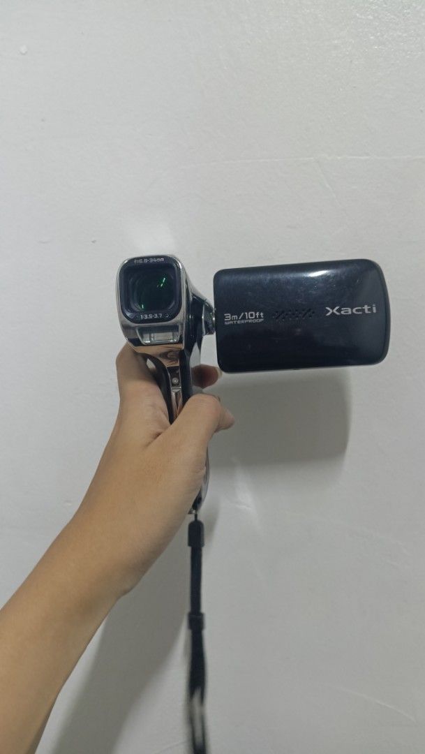 Sanyo Xacti DMX-CA100 Waterproof HD Camcorder (WORKING) (Category: Video Cameras) located in Manila. Submitted by declutt3r_ (Listing ID 1455837637, Image 2). Description: comes with battery and w/ complete accessories (pls see last photo for all the inclusions) - vintage/ retro camcorder output - df/sf is c/o buyer - buy at your own risk - no return/refund - rfs: decluttering - for serious buyer, feel free to msg me for sample photos/ footages �