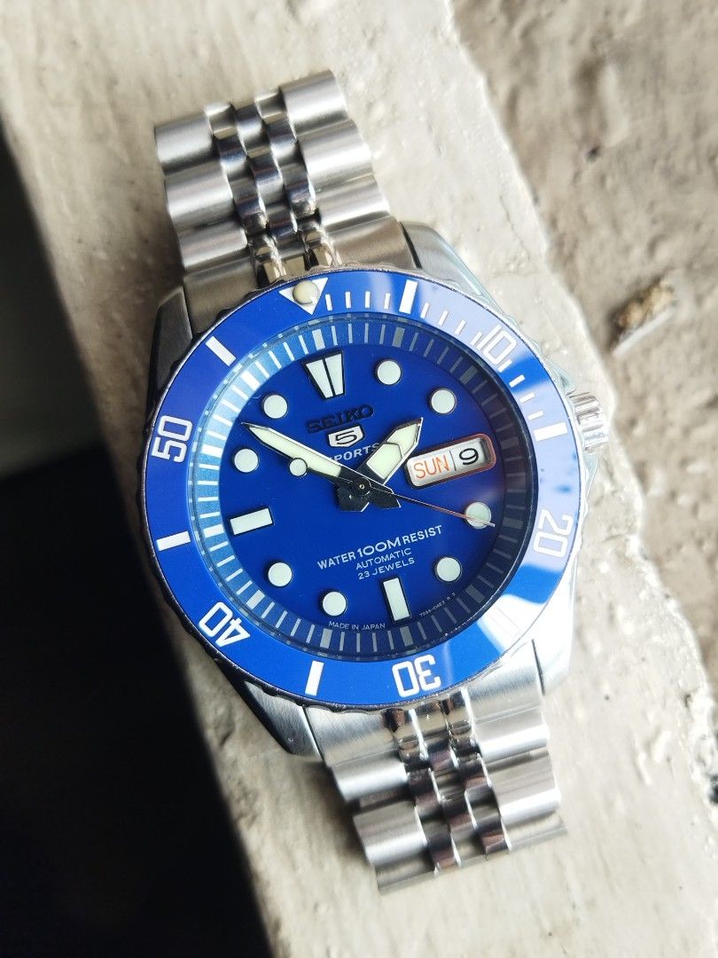 Seiko SNZF13J "Smurf" RARE (Category: Men's Watches) located in Valenzuela. Submitted by jsn0531 (Listing ID 1455793275, Image 2). Description: Caliber 7s36 Automatic 23jewels Made in Japan Serial #: 95xxxx BMBY: May 2009 Case diameter: 41mm Lug size: 22mm Aftermarket Solid Links Jubilee Bracelet Luminous hands and dial markers Ceramic Blue bezel insert Unit only, no box and papers Pm me if interested. Delivery through LBC or Lalamove. Meet ups V