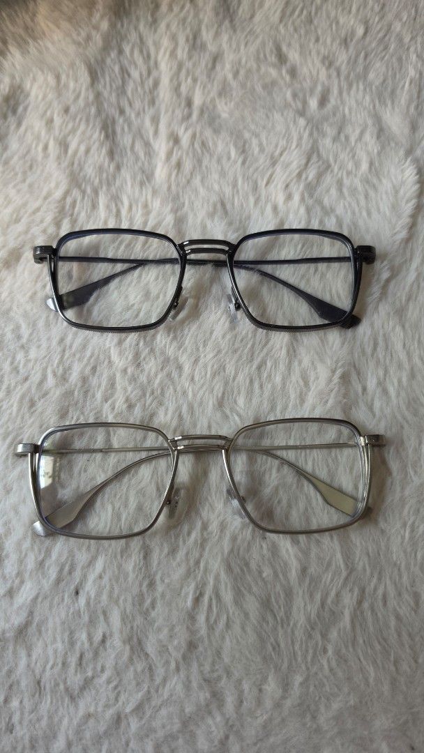 Spectacles Frames (Category: Sunglasses & Eyewear) located in Singapore. Submitted by duoxxx (Listing ID 1455713142, Image 1). Description: as seen in picture, 2 brand new full metal frames for sale stem-to-stem: 14.5cm lens size: 5.5cm no box, just frame in a zip lock bag. too small for me. my loss your gain $20 each..