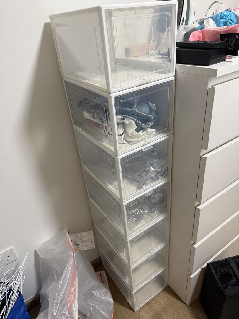 Stackable Clear Storage Boxes with White Frames (Category: Storage Boxes & Baskets) located in Singapore. Submitted by piscesbabyxo (Listing ID 1455794162, Image 1). Description: - Set of stackable storage boxes - Clear fronts for easy visibility - White frames - Ideal for shoes, clothes, and general storage - Secure stacking mechanism - Helps maintain a tidy living space - I have 11 of this, $55 for 11 or $6 for one -self pick up at Tampines are