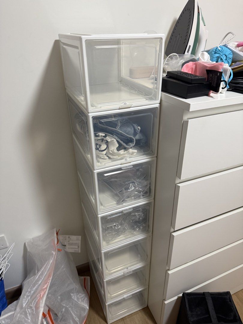 Stackable Clear Storage Boxes with White Frames (Category: Storage Boxes & Baskets) located in Singapore. Submitted by piscesbabyxo (Listing ID 1455794162, Image 2). Description: - Set of stackable storage boxes - Clear fronts for easy visibility - White frames - Ideal for shoes, clothes, and general storage - Secure stacking mechanism - Helps maintain a tidy living space - I have 11 of this, $55 for 11 or $6 for one -self pick up at Tampines are