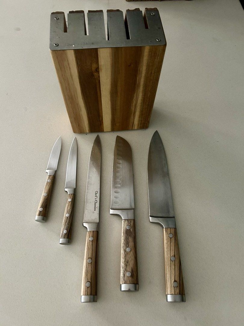 Stainless Steel Chef Classic Knife Set (Category: Knives & Chopping Boards) located in Paranaque City. Submitted by missriiri (Listing ID 1455686919, Image 1). Description: High quality stainless steel knife set with banyan wood handles and holder Gently used and well kept .