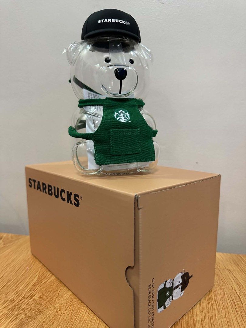 Starbucks Bearista Glass Cold Cup (Category: Water Bottles & Tumblers) located in Valenzuela. Submitted by patpeev (Listing ID 1455784809, Image 2). Description: For Sale - Starbucks Bearista Glass Cold Cup - Green Apron, Black Cap Edition - Unused - With box and authenticity card - 25 oz Php 2900 MOD: Lalamove (within NCR), JNT (outside NCR) MOP: Cash, Gcash or Maya 📍Marulas, Valenzuela.