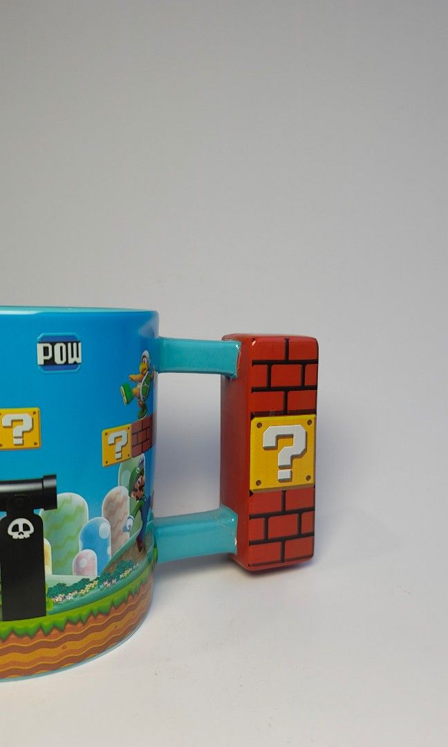 Super Mario mug (Category: Character Goods) located in Cavite. Submitted by phtmt (Listing ID 1455790672, Image 3). Description: Repaired Handle. For Display only These are factory pull-out items, so minor imperfections or flaws may be present. Please manage your expectations..