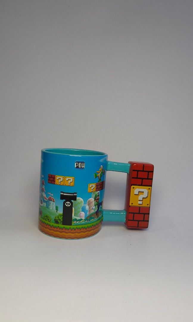 Super Mario mug (Category: Character Goods) located in Cavite. Submitted by phtmt (Listing ID 1455790672, Image 2). Description: Repaired Handle. For Display only These are factory pull-out items, so minor imperfections or flaws may be present. Please manage your expectations..
