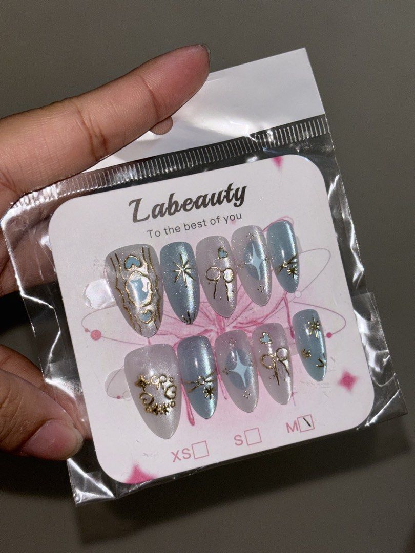 TAKE ALL! Fake Nails Beautiful Sparkly Nails (Category: Hands & Nails) located in Manila. Submitted by meliorashop22 (Listing ID 1455815666, Image 2). Description: Hindi nasuot kasi malaki sa daliri although I filed the pink once konti pero di naman halata - no glue or nail file.