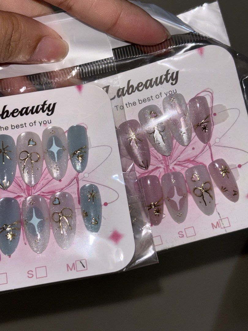 TAKE ALL! Fake Nails Beautiful Sparkly Nails (Category: Hands & Nails) located in Manila. Submitted by meliorashop22 (Listing ID 1455815666, Image 1). Description: Hindi nasuot kasi malaki sa daliri although I filed the pink once konti pero di naman halata - no glue or nail file.