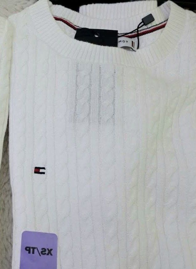 Tommy Hilfiger Cable Knit Sweater XS/TP (Category: Longsleeves) located in Manila. Submitted by majimi (Listing ID 1455834498, Image 3). Description: - Brand: Tommy Hilfiger - Style: Cable Knit Sweater - Available Sizes: XS/TP - Colors: Light Green, Light Blue, Burgundy, White - Material: Soft and comfortable - Versatile: Perfect for layering or wearing on its own.