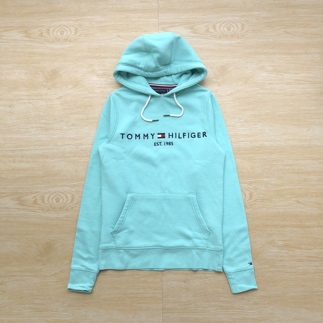 Tommy Hilfiger Spell out hoodie jacket (Category: Coats, Jackets and Outerwear) located in Cavite. Submitted by nicepicker (Listing ID 1455744698, Image 1). Description: Size on Tag: XS Dimension: 17.5 x 25 Condition: 9.5/10 Flaws: None .