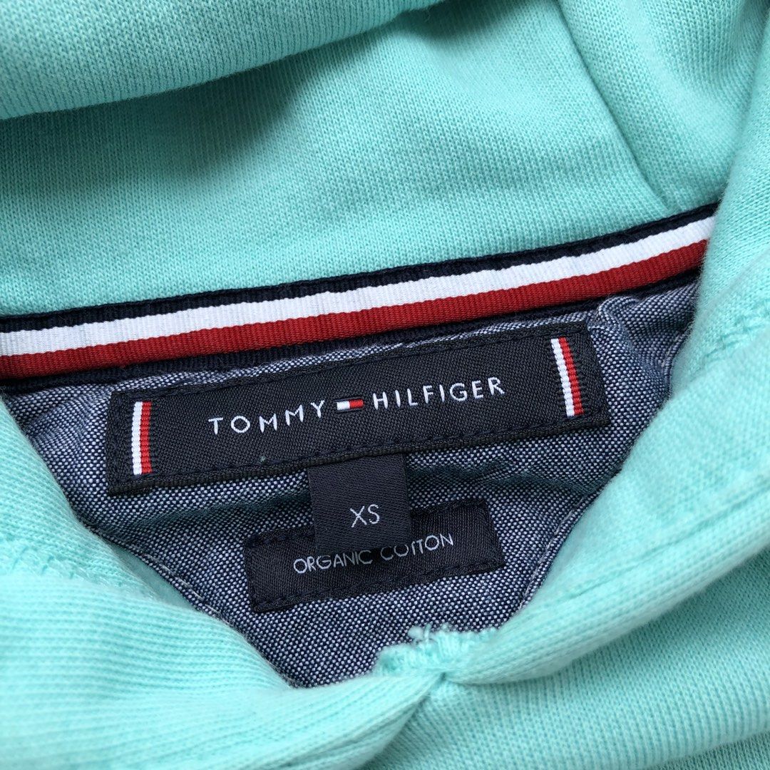 Tommy Hilfiger Spell out hoodie jacket (Category: Coats, Jackets and Outerwear) located in Cavite. Submitted by nicepicker (Listing ID 1455744698, Image 3). Description: Size on Tag: XS Dimension: 17.5 x 25 Condition: 9.5/10 Flaws: None .