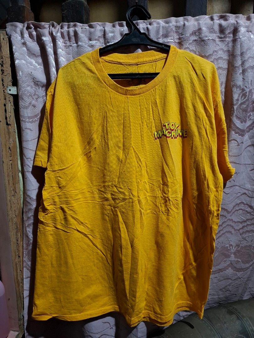 Toy Machine Yellow Graphic T-Shirt (Category: Tshirts & Polo Shirts ) located in Victorias. Submitted by doc_keith (Listing ID 1455825395, Image 2). Description: - Yellow Toy Machine graphic t-shirt - Features a cool devil skull design on the front - Small Toy Machine logo on the back near the collar - Ideal for everyday casual wear 880 shipped Negros Occidental .