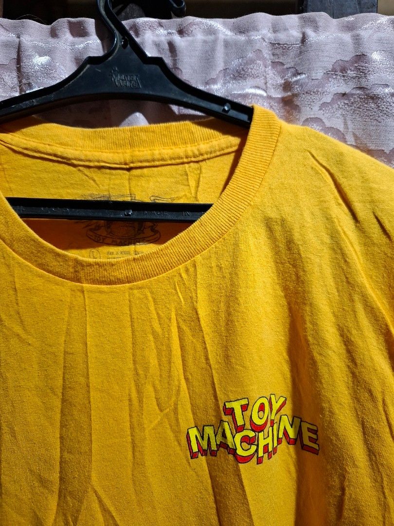 Toy Machine Yellow Graphic T-Shirt (Category: Tshirts & Polo Shirts ) located in Victorias. Submitted by doc_keith (Listing ID 1455825395, Image 3). Description: - Yellow Toy Machine graphic t-shirt - Features a cool devil skull design on the front - Small Toy Machine logo on the back near the collar - Ideal for everyday casual wear 880 shipped Negros Occidental .