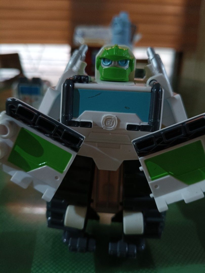 Transformers Rescue Bots Heatwave Toy (Category: Action & Battle Toys) located in Angeles City. Submitted by mysticdeer-32c4 (Listing ID 1455728775, Image 3). Description: - Rescue Bots Heatwave toy - Transforms from robot to vehicle - Green and white colors - Minor scuffs on chest area - Perfect for kids who love Transformers - Ready for a new home!.
