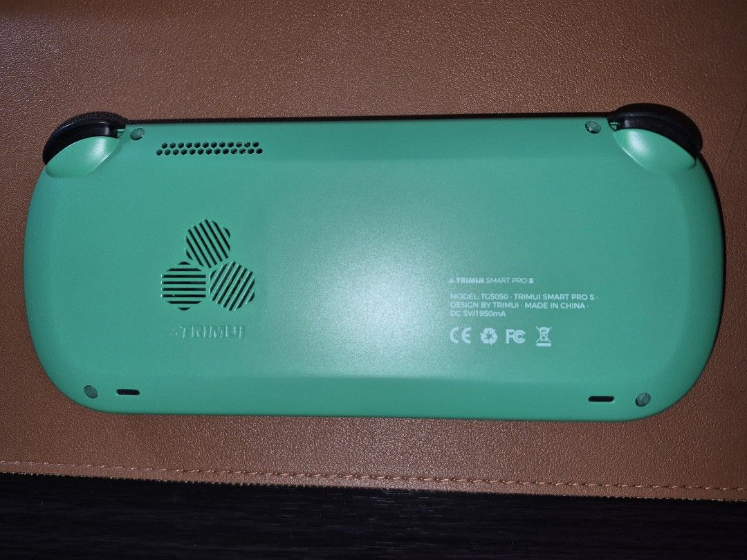 Trimui Smart Pro S Handheld Game Console - Green (Category: Others) located in Batangas. Submitted by lawrencecastro (Listing ID 1455806641, Image 2). Description: Selling a Trimui Smart Pro S handheld console. RFS: Dont play games on it anymore. Includes a 16gb sd card installed with some games like Persona 3. Also installed is a screen protector and it comes with the original case and box..