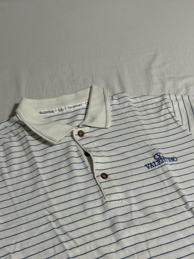 VALENTINO Striped Polo Shirt (Category: Tshirts & Polo Shirts ) located in Pasig City. Submitted by lyle.archive (Listing ID 1455833487, Image 1). Description: Decluttering: VALENTINO Striped Polo Shirt Price: 250 Size: M Usage: Well used Via GrabExpress or Lalamove from Ugong, Pasig (SF by buyer).