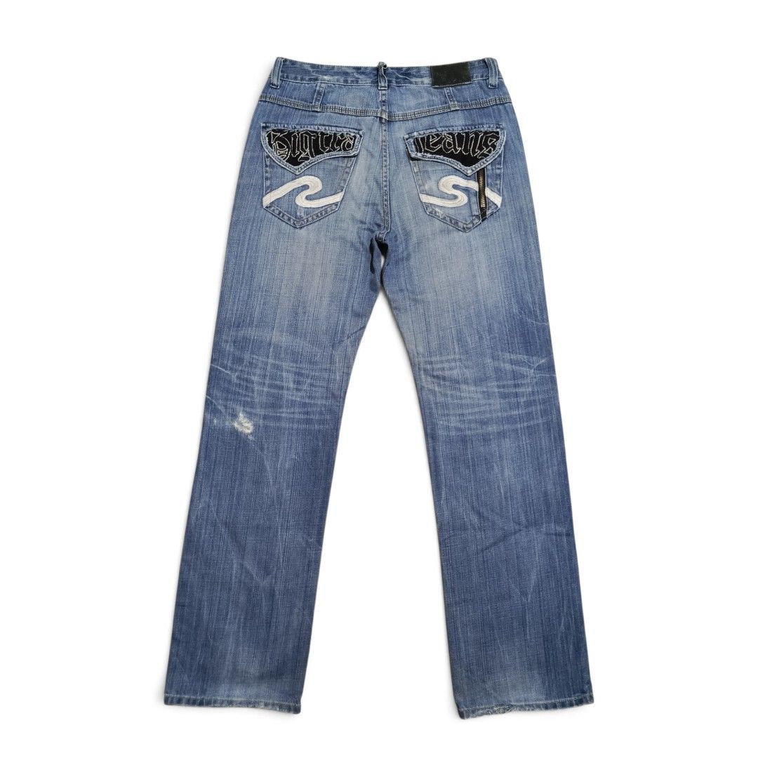 Vintage Osaka Big Train Jeans (Distressed) (Category: Jeans) located in Iloilo. Submitted by old_times (Listing ID 1427303000, Image 2). Description: 2000s Osaka Big Train Jeans (Distressed) Measurements (inches): Waist: 35 Width: 20 Leg Width: 10 Length: 43.4 Hem: 8 Condition: Distressed Holes Patches Heel Drags Details: Embroidery (Back Pockets) Zipper (Back Pockets) Embroidered Tag (Waist) ₱400 (+ Shipping fee) loc: iloilo courier: J&T Shippin