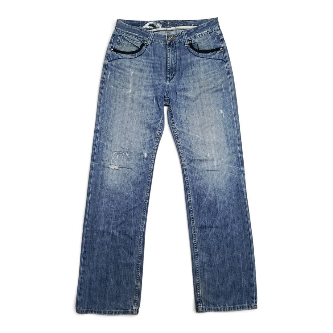 Vintage Osaka Big Train Jeans (Distressed) (Category: Jeans) located in Iloilo. Submitted by old_times (Listing ID 1427303000, Image 1). Description: 2000s Osaka Big Train Jeans (Distressed) Measurements (inches): Waist: 35 Width: 20 Leg Width: 10 Length: 43.4 Hem: 8 Condition: Distressed Holes Patches Heel Drags Details: Embroidery (Back Pockets) Zipper (Back Pockets) Embroidered Tag (Waist) ₱400 (+ Shipping fee) loc: iloilo courier: J&T Shippin