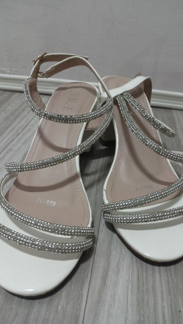 White Block Heels with Rhinestone Straps (Category: Heels) located in Manila. Submitted by declutt3r_ (Listing ID 1455840142, Image 2). Description: - White block heel sandals - Size 38 (for reference, i'm 24.5 in cm) - Multiple straps adorned with rhinestones - Ankle strap with buckle closure - used twice only - df/sf is c/o buyer - buy at your own risk - no return/refund - rfs: decluttering .