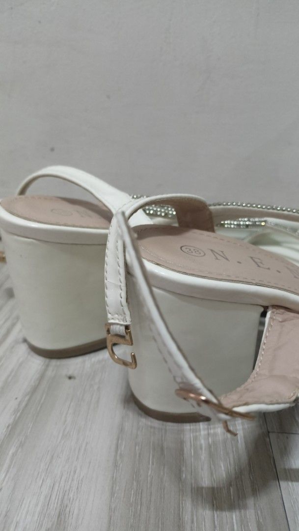 White Block Heels with Rhinestone Straps (Category: Heels) located in Manila. Submitted by declutt3r_ (Listing ID 1455840142, Image 3). Description: - White block heel sandals - Size 38 (for reference, i'm 24.5 in cm) - Multiple straps adorned with rhinestones - Ankle strap with buckle closure - used twice only - df/sf is c/o buyer - buy at your own risk - no return/refund - rfs: decluttering .