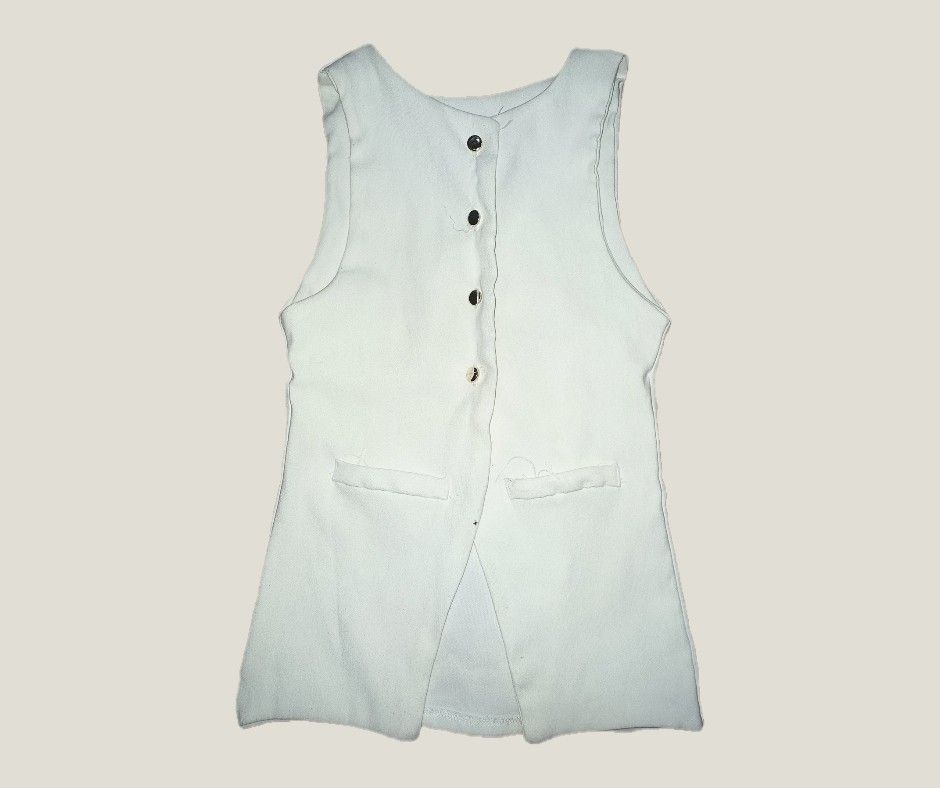 White Vest and Pants Set (Category: Sets or Coordinates) located in Valenzuela. Submitted by cybct (Listing ID 1455713156, Image 1). Description: - Size 16 to 24, Length 36 (inch) - White vest and matching pants set - Vest features button closure and two front pockets - Pants offer a clean, tailored look with pockets - Comfortable fabric for all-day wear - Ideal for smart casual occasions - Selling as a complete set.