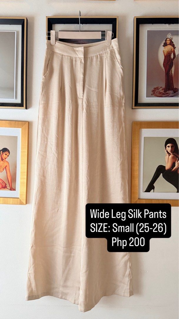 Wide Leg Silk Pants Size Small (25-26) (Category: Other Bottoms) located in Mandaluyong City. Submitted by 7thstudiobyk (Listing ID 1455846411, Image 1). Description: - Cream colored wide leg pants - Made of luxurious silk material - Fits waist size 25-26 - Perfect for casual or dressy occasions - Comfortable and flowy fit - Selling for only Php 200.