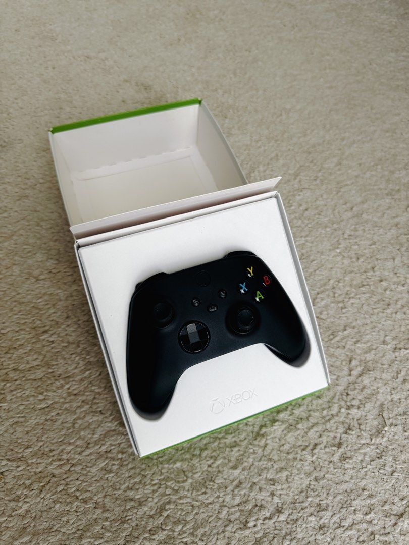 Xbox Wireless Controller (Category: Controllers) located in Singapore. Submitted by nishanov (Listing ID 1455697686, Image 2). Description: Selling Xbox Wireless Controller + USB-C cable - good working condition. Everything works perfectly and the controller is in good overall condition. Shows some normal signs of use from regular gaming. Original box and USB-C cable included. FYI I’m selling bunch of other items so check out my profile: * NuPhy 