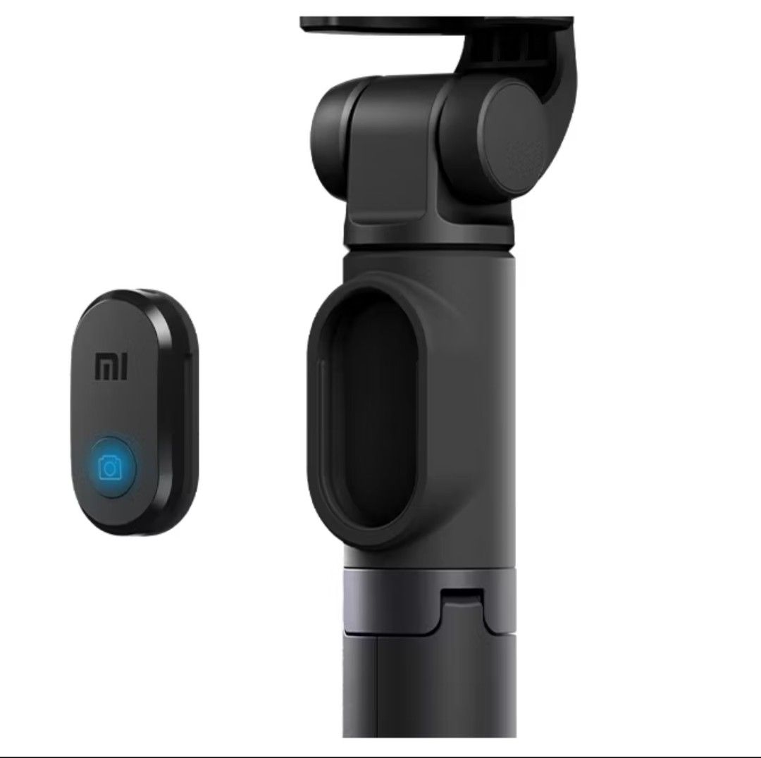Xiaomi Mi Selfie Stick Tripod with Bluetooth Shutter (Category: Tripods & Monopods) located in Paranaque City. Submitted by jasminepc (Listing ID 1455753993, Image 3). Description: - Xiaomi Mi Selfie Stick Tripod - Dual function: Selfie Stick & Tripod - Detachable Bluetooth shutter remote - Extendable aluminum monopod - Non-slip grip for secure handling - 360-degree rotating phone holder - Ideal for capturing photos and videos.