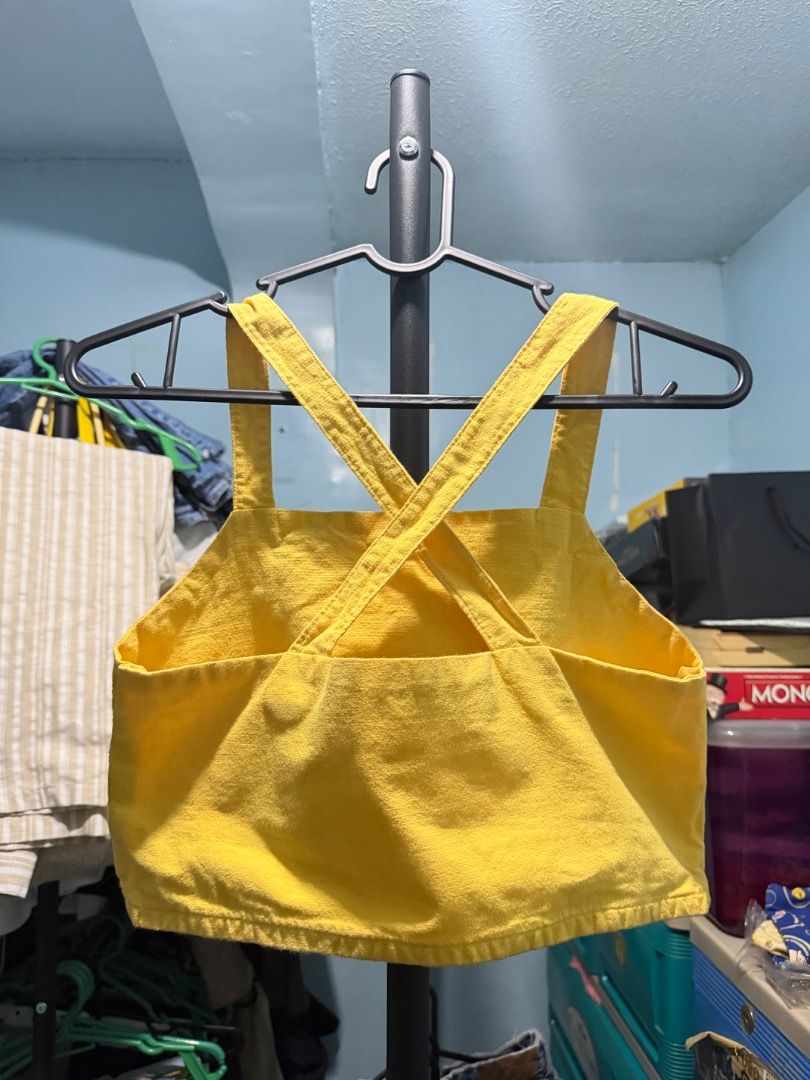 Yellow Cross Strap linen top (Category: Others Tops) located in Manila. Submitted by clairedeee (Listing ID 1455682553, Image 2). Description: Cute yellow crop top with cross straps at the back..