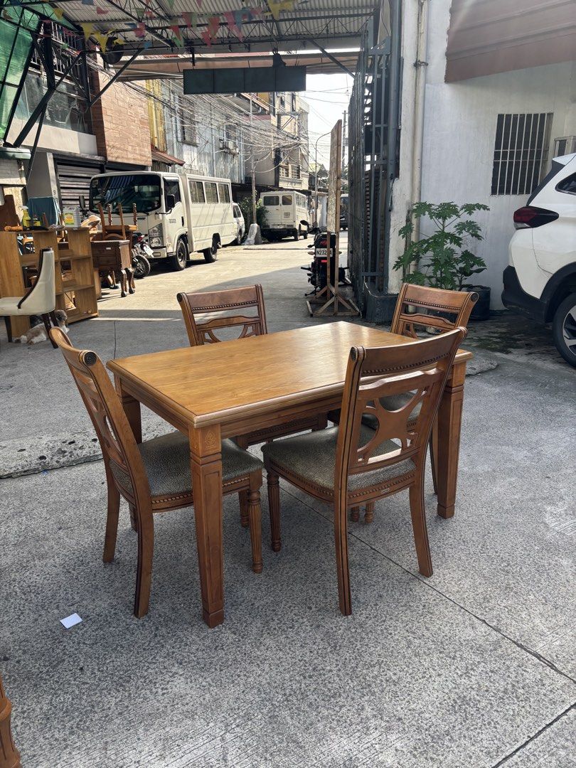 4 Seaters Classic Dining Furniture Set (Category: Tables & Sets) located in Malabon City. Submitted by ella_dlcrz (Listing ID 1455868401, Image 2). Description: 4 Seaters Classic Dining Furniture Set Good Condition Brand: Deca-line, Pre-loved Japan surplus Materials: Solidwood, Decorative Plywood, Leather Size: Table Length - 47.5 inches Width - 31.75 inches Height- 28.75 inches Chairs Height (Seat) - 19 inches Height (Back Rest) - 36.5 inches Wi