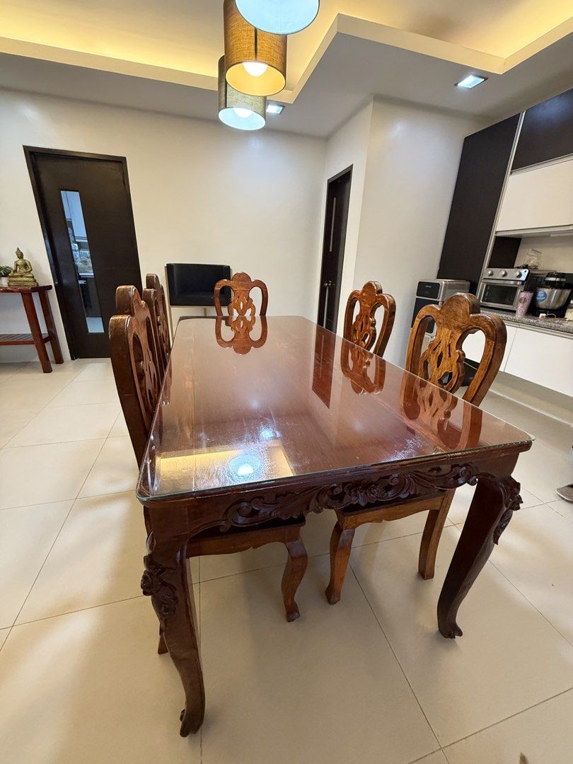 6 seater dining set (Category: Tables & Sets) located in Mandaluyong City. Submitted by blanka (Listing ID 1455866421, Image 3). Description: Very sturdy. 1 chair needs repair. Slightly nego .