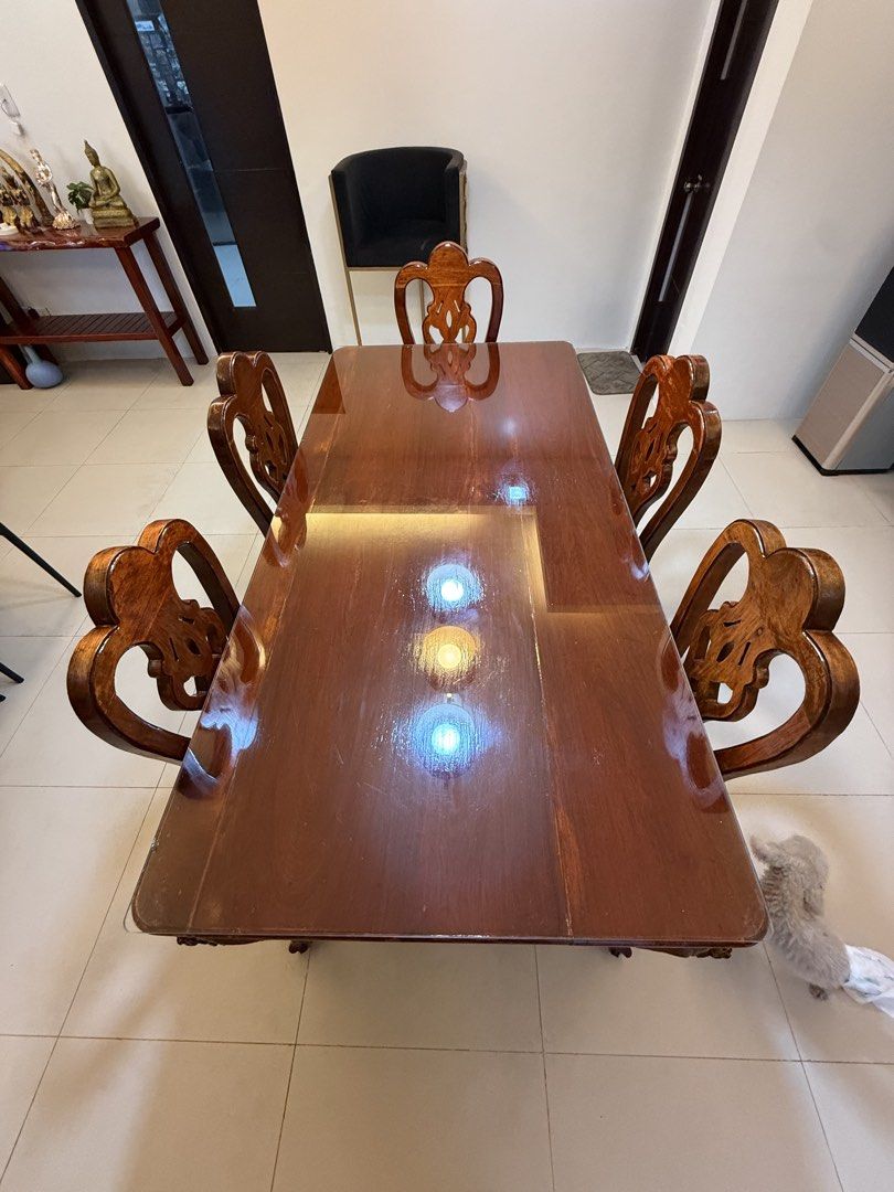 6 seater dining set (Category: Tables & Sets) located in Mandaluyong City. Submitted by blanka (Listing ID 1455866421, Image 2). Description: Very sturdy. 1 chair needs repair. Slightly nego .