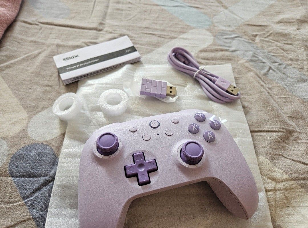 8BitDo Ultimate 2C Bluetooth Wireless Controller PURPLE (Category: Controllers) located in Davao. Submitted by bvxbmvn (Listing ID 1455960956, Image 1). Description: 8Bitdo Ultimate 2C Bluetooth Wireless Controller in purple can connect through laptop/pc/phone used twice only, kept in the box the rest of the time includes: box, manual, adapter, usb cable, rfs: dont use anymore :( please dont hesitate to send a pm for inquiries!.