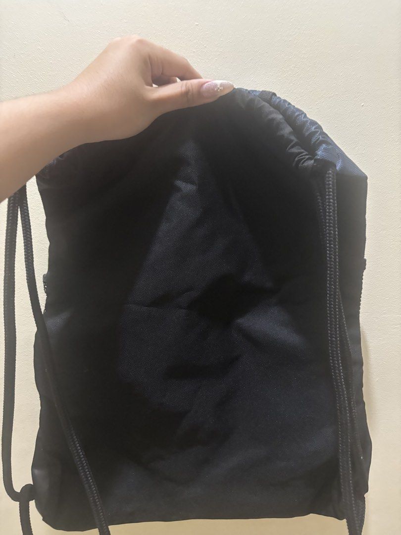 Adidas Drawstring Bag Navy Blue (Category: Backpacks) located in Manila. Submitted by karinaaaaaaa2000 (Listing ID 1456001756, Image 2). Description: - Navy blue Adidas drawstring bag - Front zip pocket - Mesh side pockets - Black base - Adidas logo and three stripes on front - Drawstring closure - Ideal for gym or sports loc: marikina mop: gcash/bank transfer mod: j&t express or lalamove.