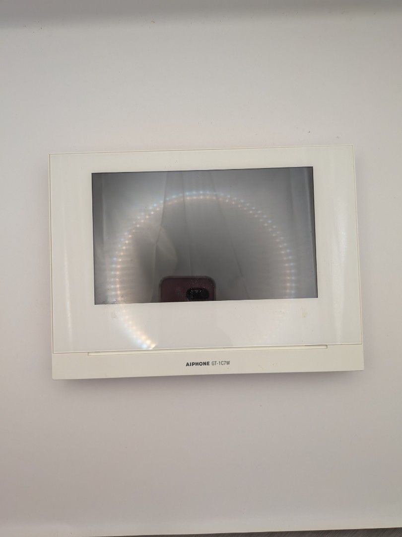AIPhone Intercom device (Category: Security Systems & CCTV Cameras) located in Singapore. Submitted by twasit (Listing ID 1455965440, Image 1). Description: - AIPhone GT-1C7W Intercom Device - Sleek white design - Ideal for home security and communication - Good if you are a tenant or landlord looking to replace your existing device. - This unit allows you to connect your door entry to Wifi and remotely open the door..