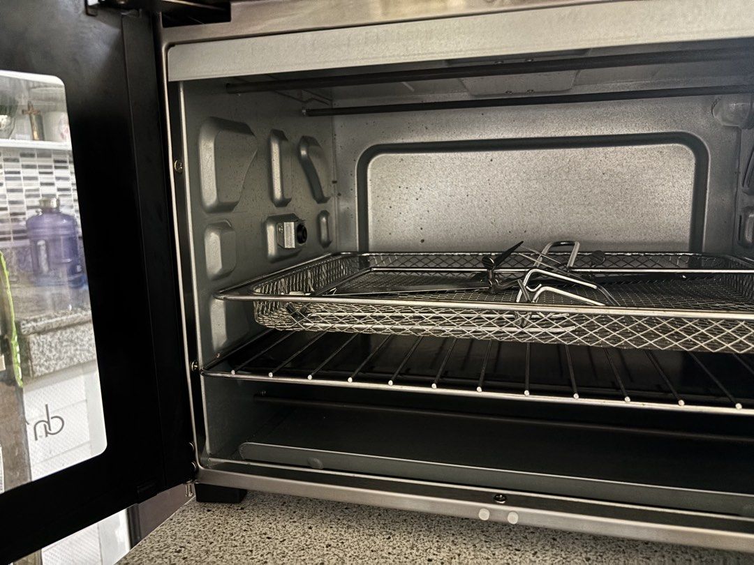 Air Fryer Oven (Category: Ovens & Toasters) located in Pasig City. Submitted by pauline.hk (Listing ID 1455943708, Image 3). Description: - American Heritage double-door air fryer oven - Sleek stainless steel design - Multi-functional: Air Fry, Bake, Toast, Roast, and more! - Comes with air fryer basket and tongs - No more box - Seldom used Can be picked up: Mabolo II, Bacoor, Cavite.
