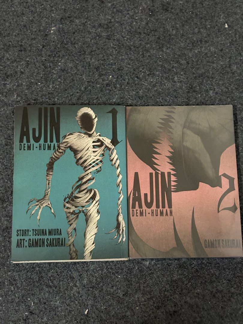 Ajin Vol. 1 & Vol.2 (Category: Comics & Manga) located in Manila. Submitted by koolthing (Listing ID 1455970292, Image 1). Description: Ajin Volume 1 Condition is great and well kept Ajin Volume 2 Still sealed and unopened TAKE ALL for 600 Message me if you want to buy separately.