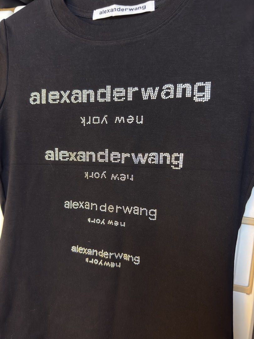 Alexander Wang Black Rhinestones Shirt (Category: Shirts) located in Imus. Submitted by camofproject.647 (Listing ID 1455863732, Image 2). Description: Alexander Wang Black Rhinestones Shirt Measurements: Width - 19 in. or 38 in. BUST stretch fabric up to 40 in. BUST Length - 18 in. Shoulder - 14 in. Color - Black - ACTUAL PHOTO ALREADY POSTED. - PRICE ALREADY INDICATED. - NO WHEN WORN. Pick up via Lalamove at Imus City, Cavite or standard shippi