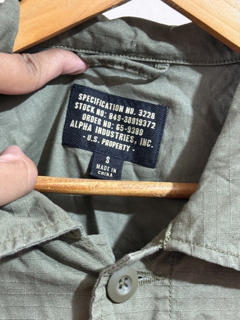 ALPHA INDUSTRIES - Field Jacket Flying Tigers (Category: Activewear) located in Cavite. Submitted by gooditems.cavite (Listing ID 1455962195, Image 3). Description: Size small on tag Can fit medium 20.5x29.5 18 inches shoulders 27 inches sleeves Authentic No flaws As new condition comes with extra button .