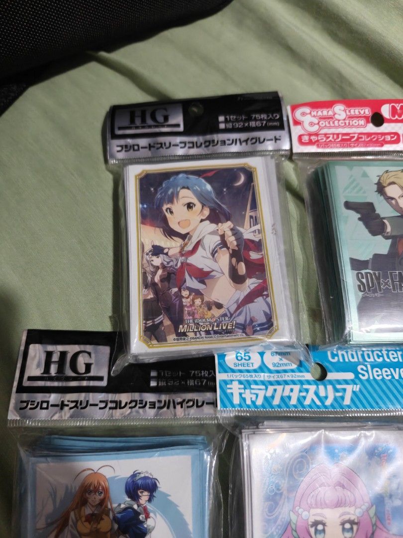 Anime Character Card Sleeves - Various Series (Category: Raw Singles) located in Caloocan City. Submitted by mackenzie001 (Listing ID 1455931124, Image 2). Description: 400 each - Protect your valuable trading card collection. - Standard size, perfect for most TCGs. - Features popular anime designs: - The Idolmaster Million Live! - Spy x Family - Dragon Drive - Other anime characters.