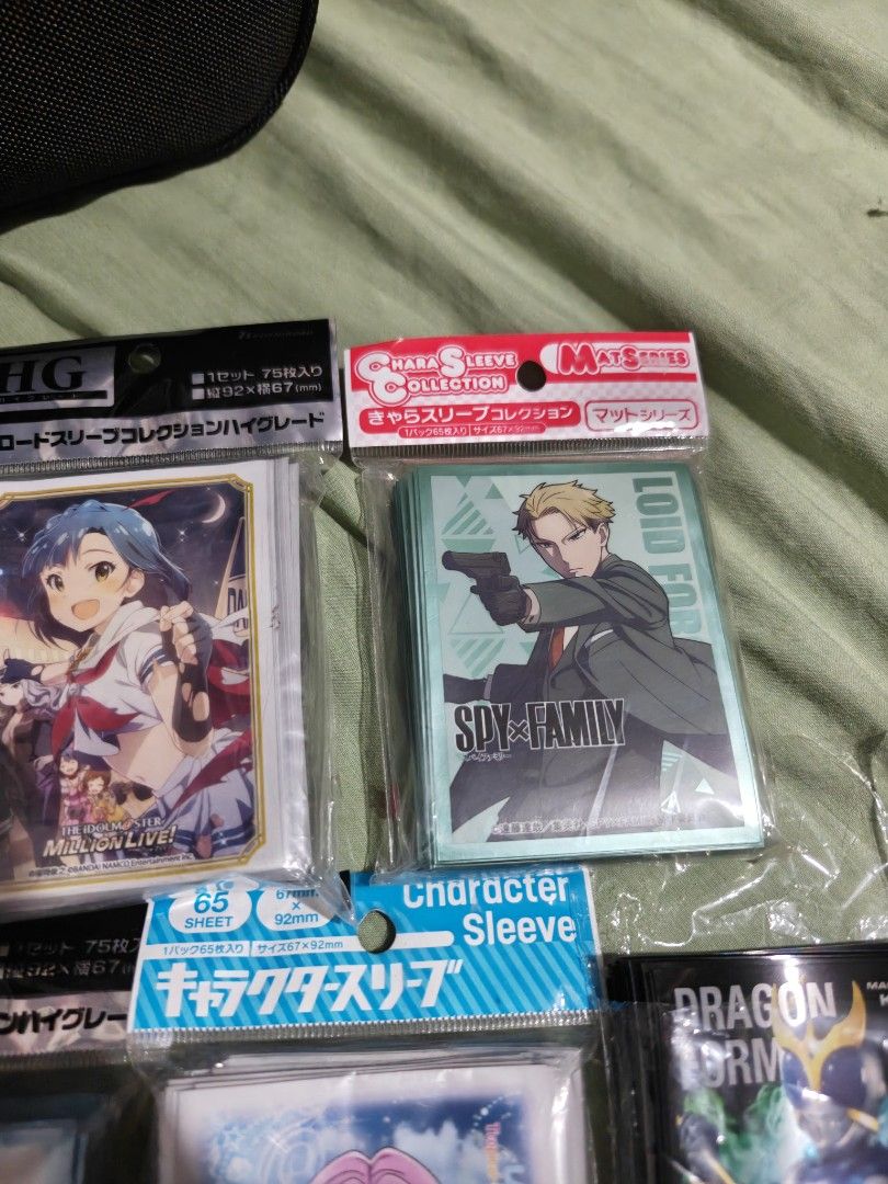 Anime Character Card Sleeves - Various Series (Category: Raw Singles) located in Caloocan City. Submitted by mackenzie001 (Listing ID 1455931124, Image 3). Description: 400 each - Protect your valuable trading card collection. - Standard size, perfect for most TCGs. - Features popular anime designs: - The Idolmaster Million Live! - Spy x Family - Dragon Drive - Other anime characters.