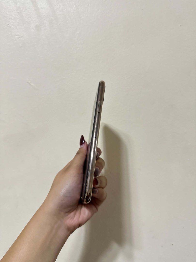 Apple iPhone 11 Pro Max Gold (Category: iPhone 11 Series) located in Manila. Submitted by rhysapollo38380 (Listing ID 1455941163, Image 3). Description: - Apple iPhone 11 Pro - Color: Gold - Globelocked (can be factory unlocked) - Features a powerful triple-camera system - Excellent display for everyday use - Ready for its next owner - No issue no dents or scratches. -Unit comes with case/cord/adaptor/ceramic tg installed/camera lens protector/ c