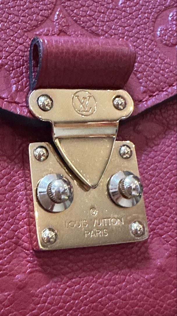 Authentic Louis Vuitton LV Metis Empriente Red (Category: Luxury Bags & Wallets) located in Las Pinas. Submitted by marshmallowmax (Listing ID 1455911700, Image 3). Description: Guaranteed Authentic! Slightly used like 9/10 condition no flaws. With box, dustbag, card and paperbag.