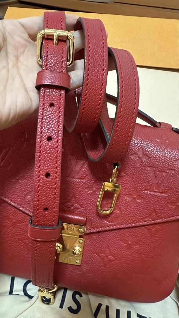 Authentic Louis Vuitton LV Metis Empriente Red (Category: Luxury Bags & Wallets) located in Las Pinas. Submitted by marshmallowmax (Listing ID 1455911700, Image 2). Description: Guaranteed Authentic! Slightly used like 9/10 condition no flaws. With box, dustbag, card and paperbag.