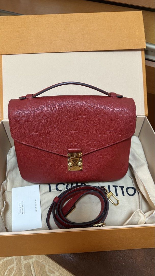 Authentic Louis Vuitton LV Metis Empriente Red (Category: Luxury Bags & Wallets) located in Las Pinas. Submitted by marshmallowmax (Listing ID 1455911700, Image 1). Description: Guaranteed Authentic! Slightly used like 9/10 condition no flaws. With box, dustbag, card and paperbag.