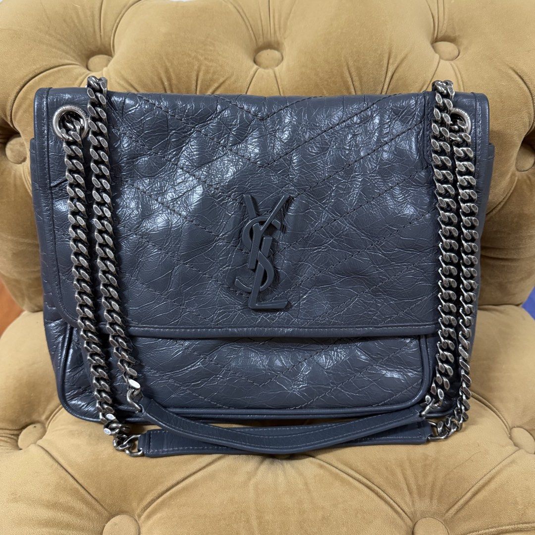 Authentic YSL Niki Medium (Category: Luxury Bags & Wallets) located in Manila. Submitted by luxuryrevamp (Listing ID 1456034242, Image 1). Description: No inlcusion Crossbody/Shoulder bag Store bought. You may request for photos to have it authenticated before buying .