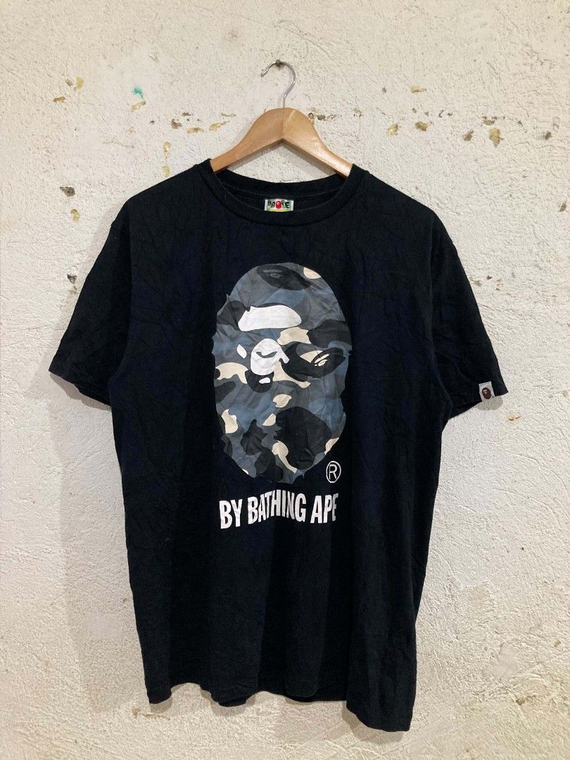 Bape Big Head Camou Glow in the Dark Tee (Authentic) (Category: Tshirts & Polo Shirts ) located in San Jose del Monte. Submitted by zen31 (Listing ID 1456050317, Image 1). Description: BAPE BIG HEAD CAMOU GLOW IN THE DARK TEE (AUTHENTIC) LARGE ON TAG 21X28 DIMENSION EXCELLENT CONDITION 10/10 COLOR RATE NO ISSUE.