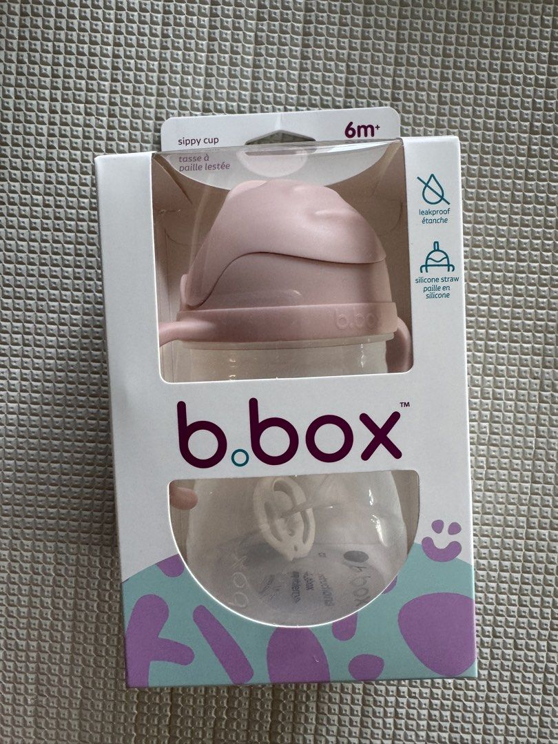 b.box Sippy Cup 6m+ Pink Leakproof Silicone Straw (Category: Weaning & Toddler Feeding) located in Quezon City. Submitted by nicole1997_ (Listing ID 1455899470, Image 1). Description: - B.Box Sippy Cup - Color: Pink - Age: Suitable for 6 months and up - Features: Leakproof design, silicone straw - Benefits: Helps little ones learn to drink independently, easy-to-hold handles - Condition: Comes in original packaging.